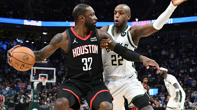 Houston Rockets forward Jeff Green (32) drives to the basket against Milwaukee Bucks forward Khris Middleton (22) 